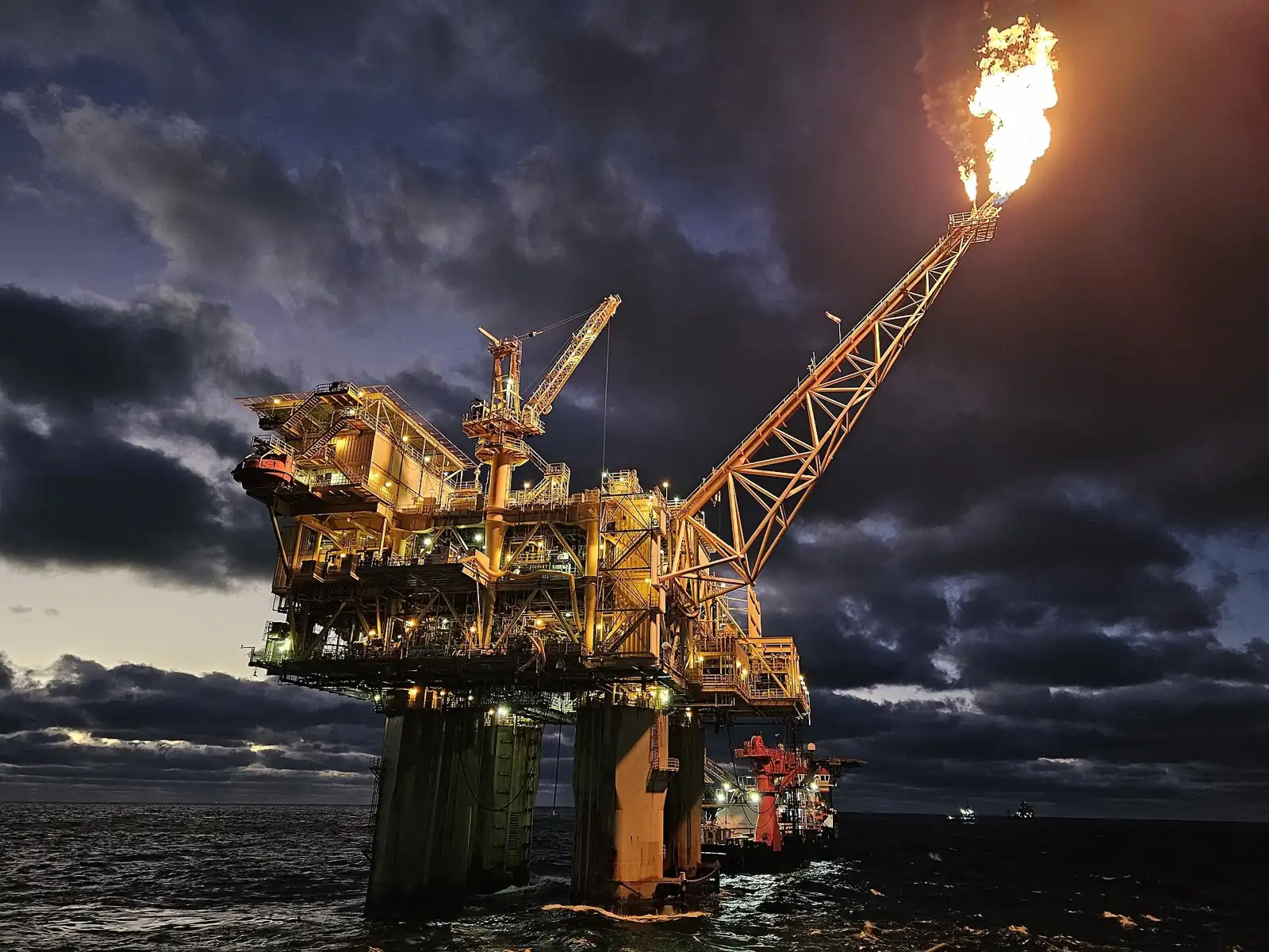 Offshore production platform at dusk